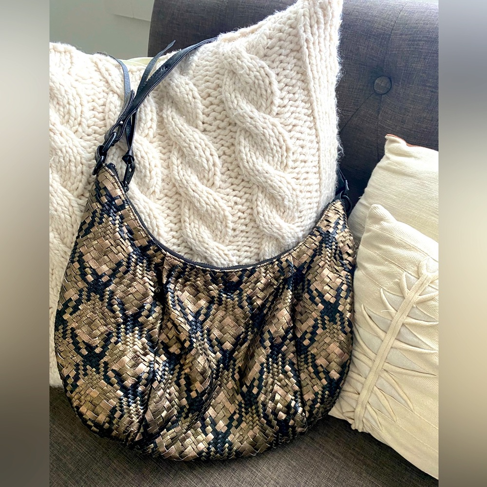 Gorgeous, woven leather, black, and metallic hobo handbag by Elliott Luca